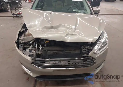 2016 Ford Focus Titanium z USA, uszkodzony, nr VIN 1FADP3N28GL326197